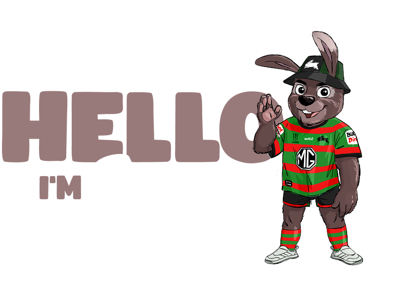 Oliver standing warmly in his South Sydney Rabbitohs kit